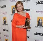 Actress Milla Jovovich poses with the Hollywood Spotlight Award during the 14th annual Hollywood Awards Gala at The Beverly Hilton Hotel on October 25, 2010 in Beverly Hills, California.