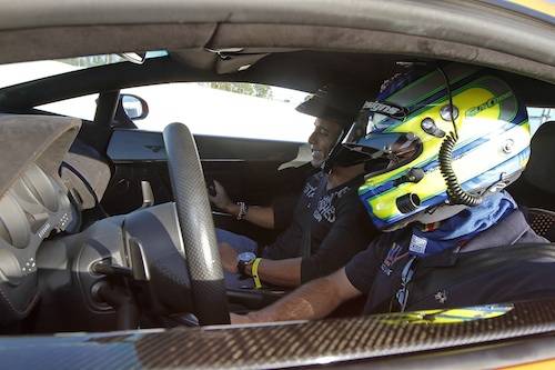 Jon Secada rides in a Lou La Vie Lamborghini with Race Car Driver Guy Cosmo
