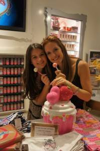 Ella Blue and Kelly Preston pose with Sugar Factory Couture Pops at Sugar Factory inside Paris Las Vegas.
