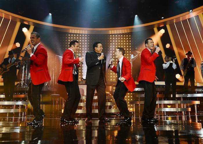 Smokey Robinson joins the crew from Human Nature on stage. Photos: Denise Truscello/WireImage 