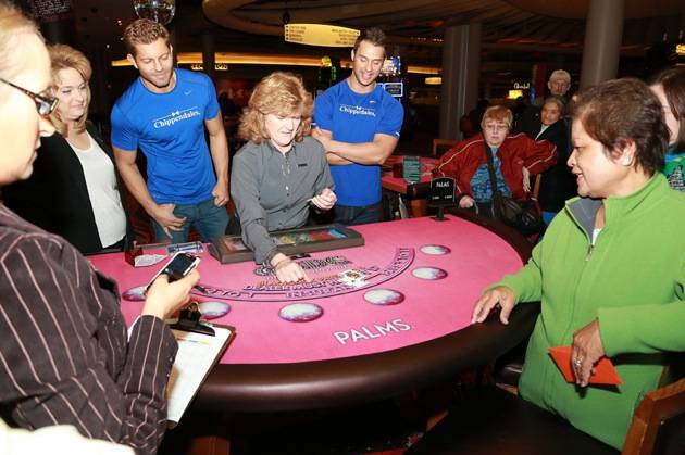 Jaymes and James Oversee the Blackjack Hand. Photos: Edison Graff  