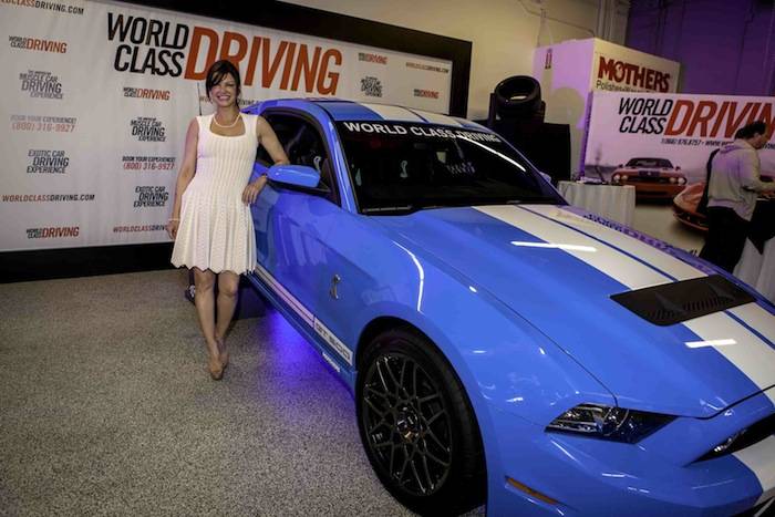 Carla Pellegrino with a 2013 Shelby GT 500 at the American Muscle Car Driving Experience Launch Party. Photos: Vik Chohan Photography