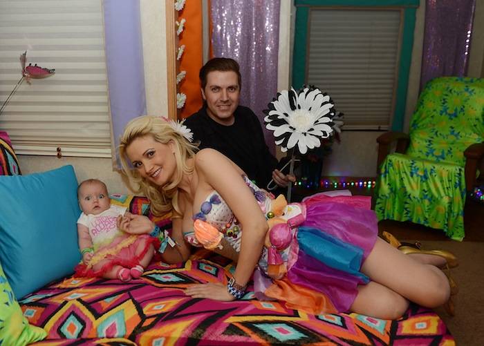 Rainbow Aurora Pasquale with her parents Holly Madison and Pasquale Rotella at the Electric Daisy Carnival. Photos: Denise Truscello/WireImage 