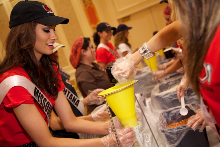 Miss USA contestants package meals for Stop Hunger Now at the Venetian and Palazzo. Photos: Audrey Dempsey 