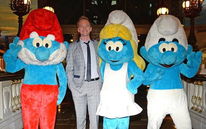 Actor Neil Patrick Harris poses with (L-R) Papa Smurf, Smurfette and Clumsy Smurf characters from Columbia Pictures and Sony Pictures Animation movie “The Smurfs 2” at the Eiffel Tower Experience bridge at Paris Las Vegas. Photos: Ethan Miller/Getty Images 