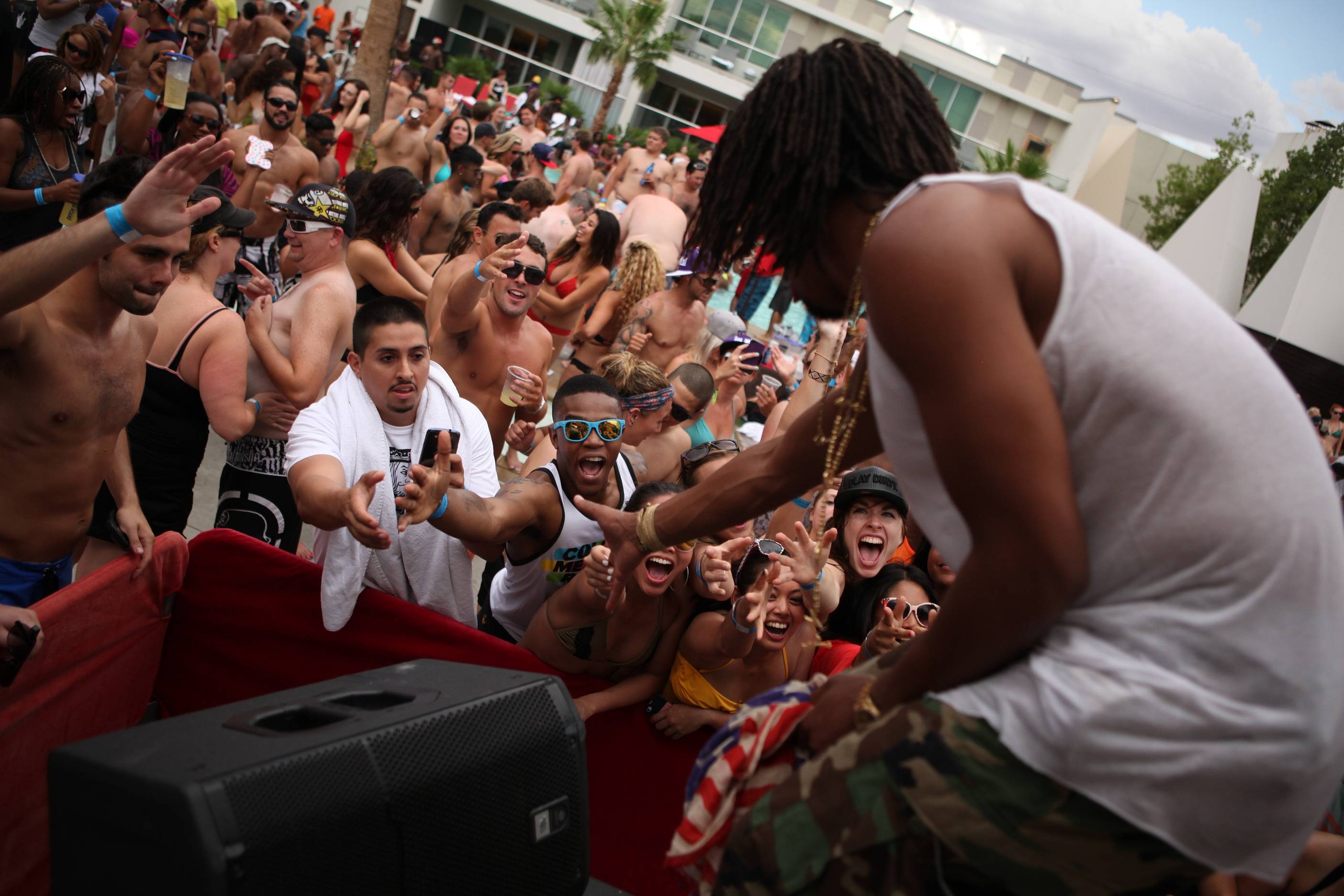 Lupe Fiasco high fives Ditch Fridays partygoers. Photos: Joe Fury 