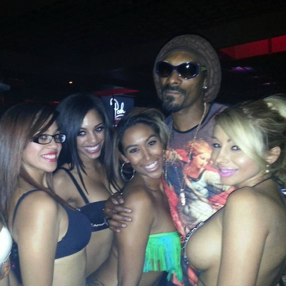 Snoop Lion and Crazy Horse III entertainers inside Posh Boutique Nightclub. 
