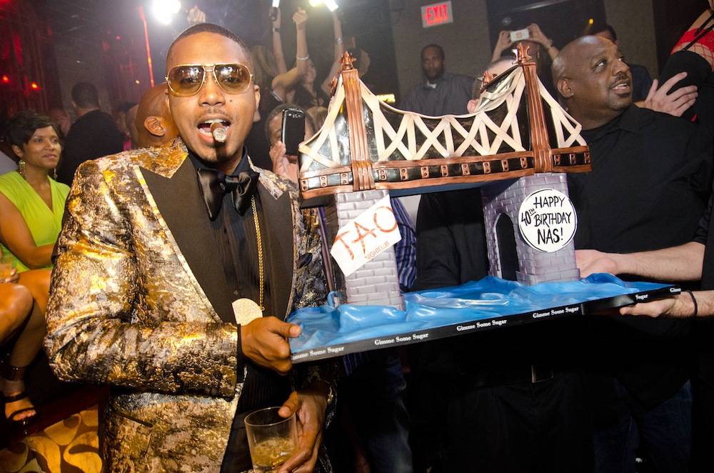 Nas with his birthday cake from Gimme Some Sugar. Photos: Karl Larson/Powers Imagery 